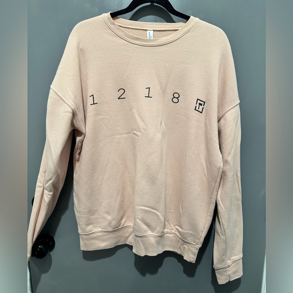 12180 crew neck sweatshirt from Hatchet Hardware. Light pink size large